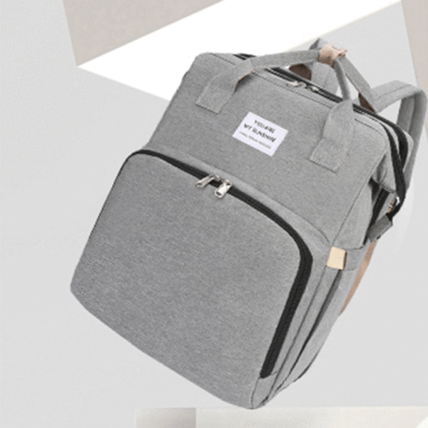 Trendy Portable Multifunctional Diaper Bag And Travel Crib